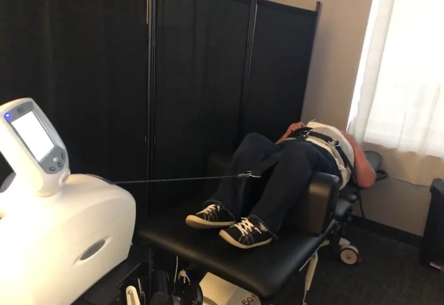 A patient on the spinal decompression table at True North Chiropractic Center